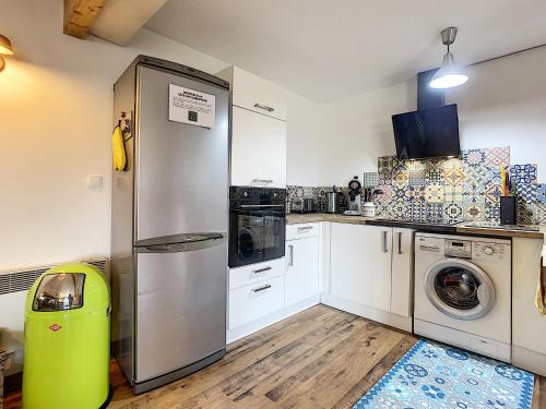 Una cocina o zona de cocina en Gîte les Gambettes