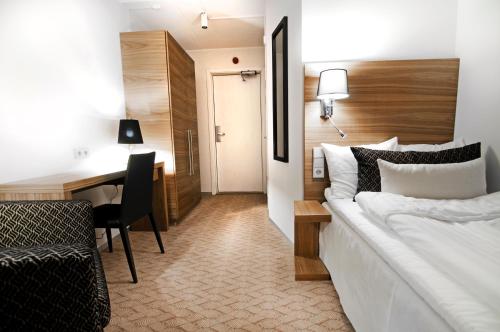 Katil atau katil-katil dalam bilik di Hotell Fjället