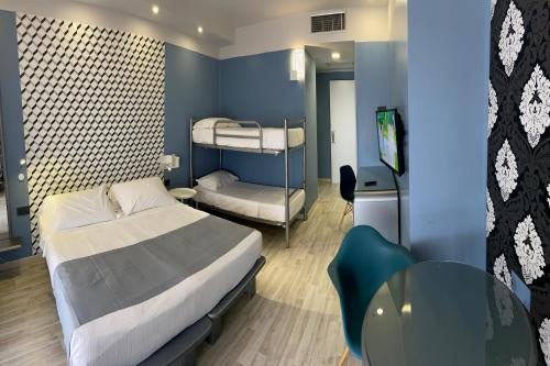 Кровать или кровати в номере Business Hotel