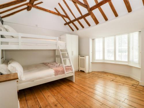 Krevet ili kreveti na kat u jedinici u objektu Oakapple Cottage