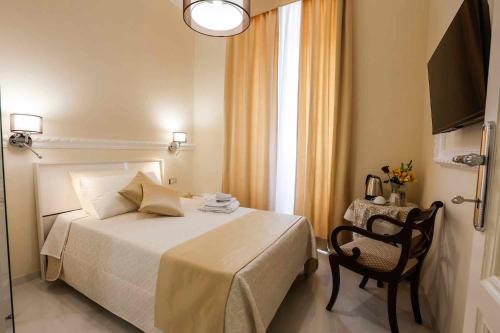 Letto o letti in una camera di CASA LILI ROMA, Bed and Breakfast