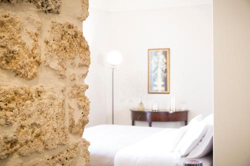 Cama o camas de una habitación en San Carlo Suites