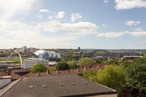 a view of the city from the roof of a building at Staybridge Suites Newcastle by IHG in Newcastle upon Tyne