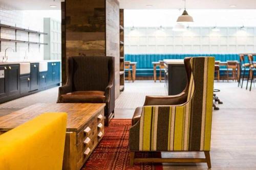 a room with chairs and a table in an office at Chapter Kings Cross in London in London