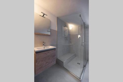 a bathroom with a shower and a sink at enJoy Home - Mansarda Piccolo Tesoro in Padova
