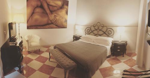 TV a/nebo společenská místnost v ubytování La Corte Dei Sogni B&B