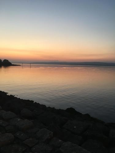 a sunset over a body of water at MOD’s place in Nenagh
