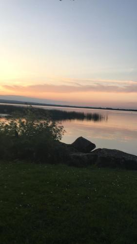 a view of a body of water at sunset at MOD’s place in Nenagh