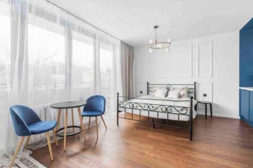 Posteľ alebo postele v izbe v ubytovaní Apartament Warszawa Centrum-blisko Starego Miasta