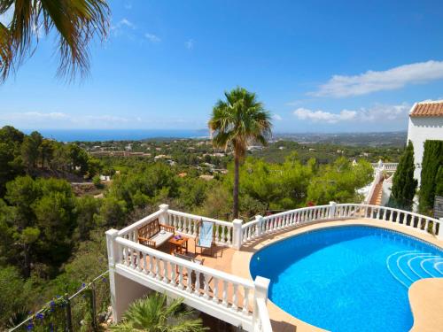 a villa with a swimming pool and a balcony at Villa Mona Lisa by Interhome in Altea