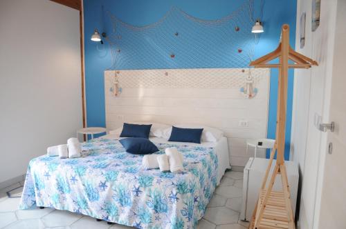 Ein Bett oder Betten in einem Zimmer der Unterkunft Maison C&G