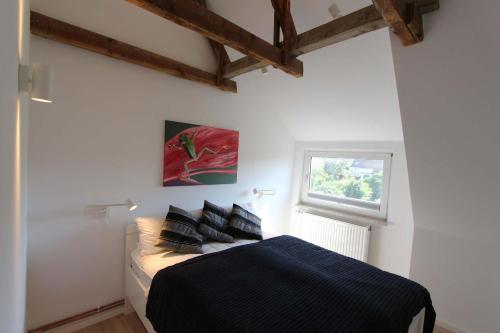 Postel nebo postele na pokoji v ubytování Haus Hahn Gorch-Fock-Weg 7