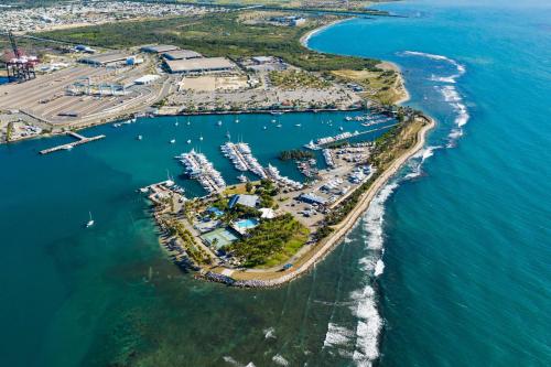 an aerial view of a harbor with boats in the water at Spacious Retreat with Private Jacuzzi and Terrace in Ponce