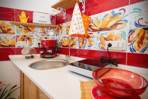 Kuchyň nebo kuchyňský kout v ubytování Holiday Room Sa Tebia