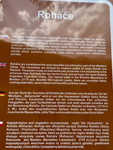 a sign that says rouge with clouds in the background at Wellness Drevenica Zuberec in Zuberec