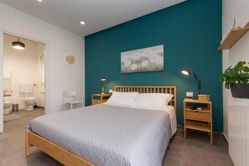 Posteľ alebo postele v izbe v ubytovaní Nerissa suites&rooms