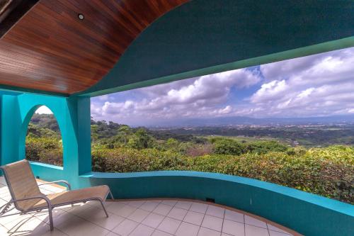 a view from the balcony of a house at Xandari Resort & Spa in Alajuela City