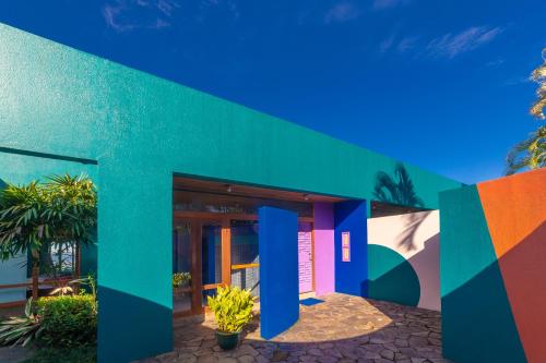 a building with a colorful facade at Xandari Resort & Spa in Alajuela City
