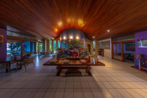 a living room with a couch and a table at Xandari Resort & Spa in Alajuela City