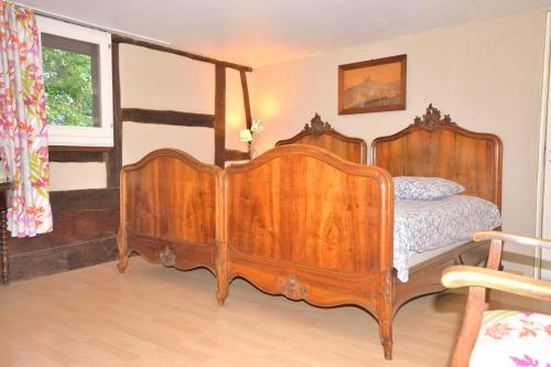 Łóżko lub łóżka w pokoju w obiekcie CHEZ CECILE Bed and Breakfast chez le VIGNERON