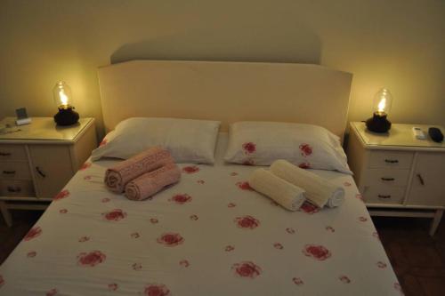 Ένα ή περισσότερα κρεβάτια σε δωμάτιο στο Κέντρο Αίγινα ήσυχη κατοικία90τμ δίπλα στη θάλασσα