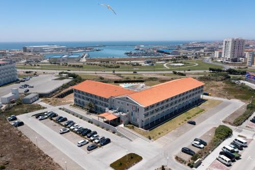 an aerial view of a building with a parking lot at Star inn Peniche in Peniche