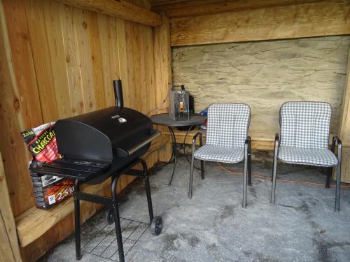 Gril dostupný pro hosty v apartmánu