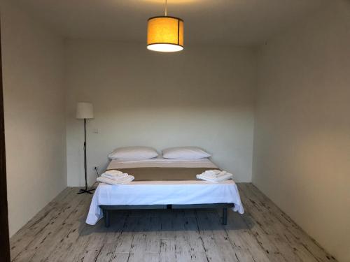 Rifugio del Diplomatico tesisinde bir odada yatak veya yataklar