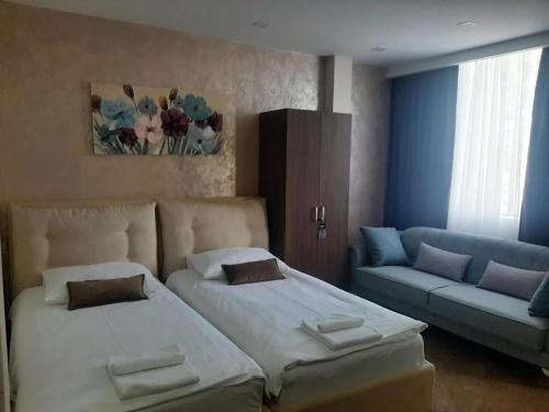 Postel nebo postele na pokoji v ubytování Hotel Usce