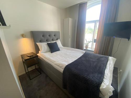 Postel nebo postele na pokoji v ubytování Frövi hotell