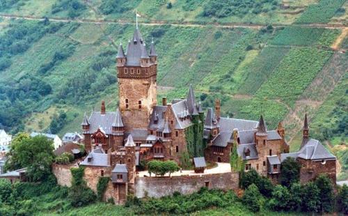 an old castle sitting on top of a hill at Haus Burgfrieden Cochem in Cochem