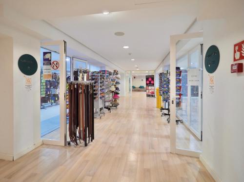 a store aisle with a lot of products on display at BQ Belvedere Hotel in Palma de Mallorca