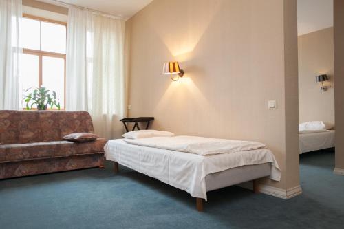 Postel nebo postele na pokoji v ubytování Guesthouse Jakob Lenz