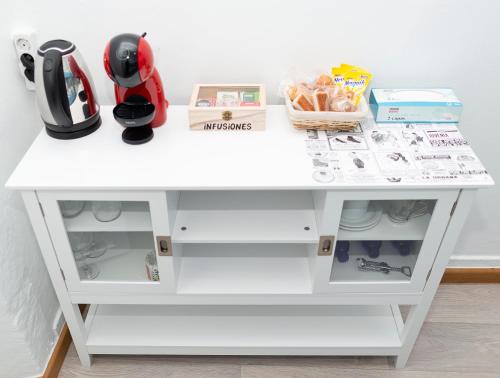 A kitchen or kitchenette at Hostal Santa Cruz