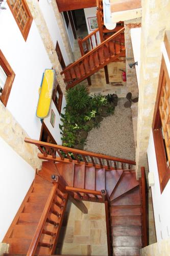 an overhead view of a staircase with wooden railings at Pousada do Cais in Paraty