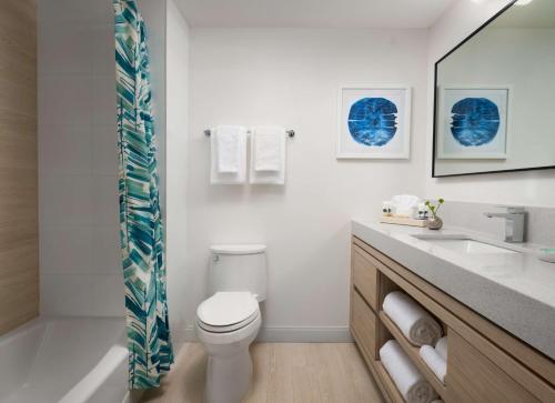 a bathroom with a toilet and a sink at Hyatt Vacation Club at Hacienda del Mar in Dorado