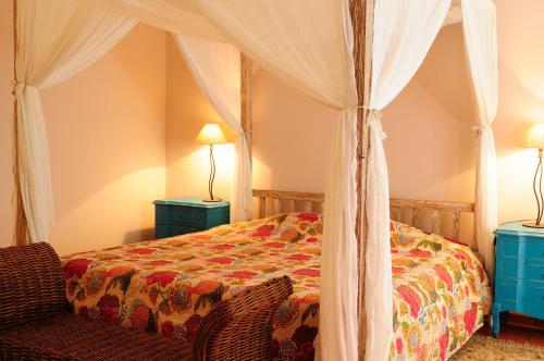 Кровать или кровати в номере Casa Do Foral