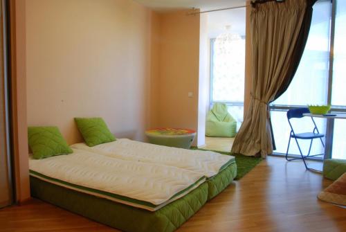 Cama o camas de una habitación en Saulėto Ryto Apartamentai