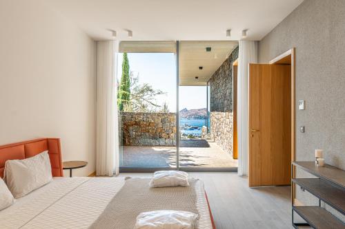 Postel nebo postele na pokoji v ubytování G Beyond Residences & Villas, Yalıkavak, Bodrum