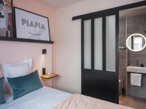 Hôtel Piapiaにあるベッド