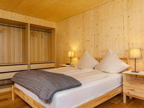 Una cama o camas en una habitación de Chalet an der Lofer