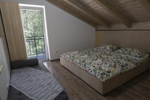 Ένα ή περισσότερα κρεβάτια σε δωμάτιο στο Chata Emily