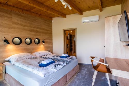 Postel nebo postele na pokoji v ubytování Marina Liptov pri Liptovskej Mare
