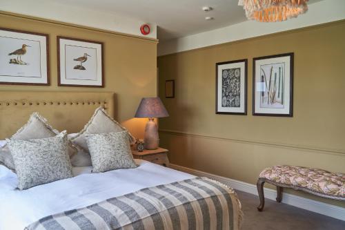 Ένα ή περισσότερα κρεβάτια σε δωμάτιο στο The Fleet Inn