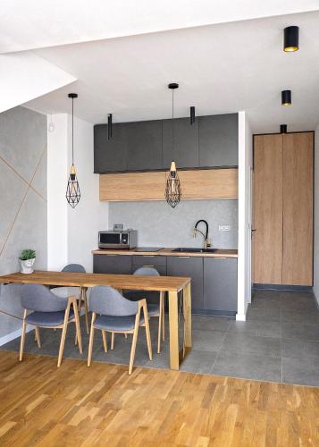 Kuchyň nebo kuchyňský kout v ubytování Modern Apart w Centrum