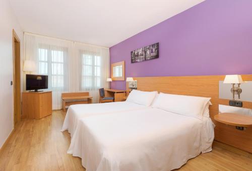 Cama o camas de una habitación en Hotel Jerez Centro, Affiliated by Meliá