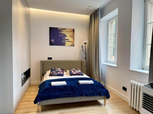 Posteľ alebo postele v izbe v ubytovaní Comfy Apartments - Old Town Center