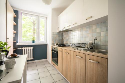 Kuchyňa alebo kuchynka v ubytovaní oompH Warsaw Central Apartment