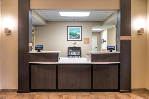a waiting room at a hospital with a counter at Candlewood Suites Paducah by IHG in Paducah