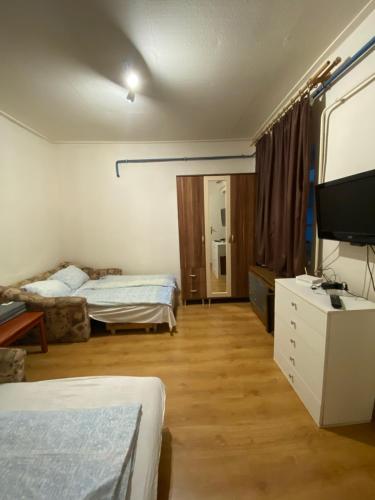 Кровать или кровати в номере Amarin Apartments